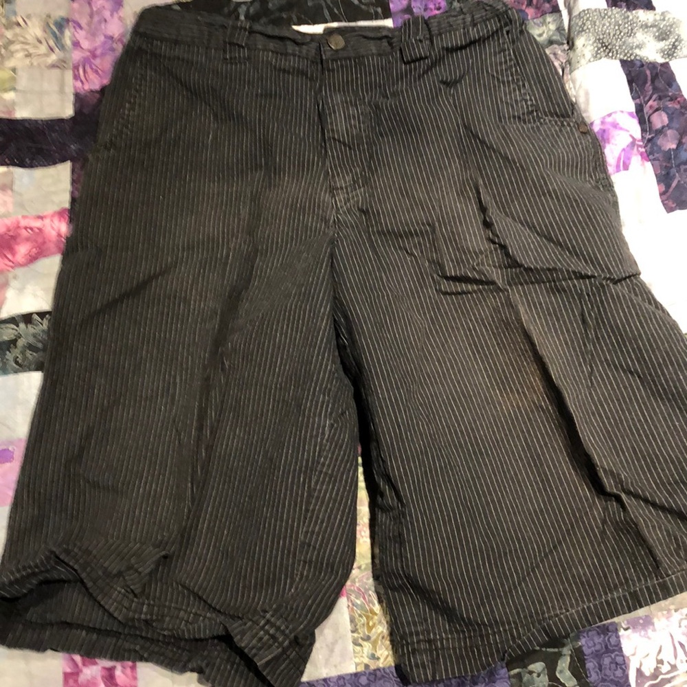 Pin striped shorts.